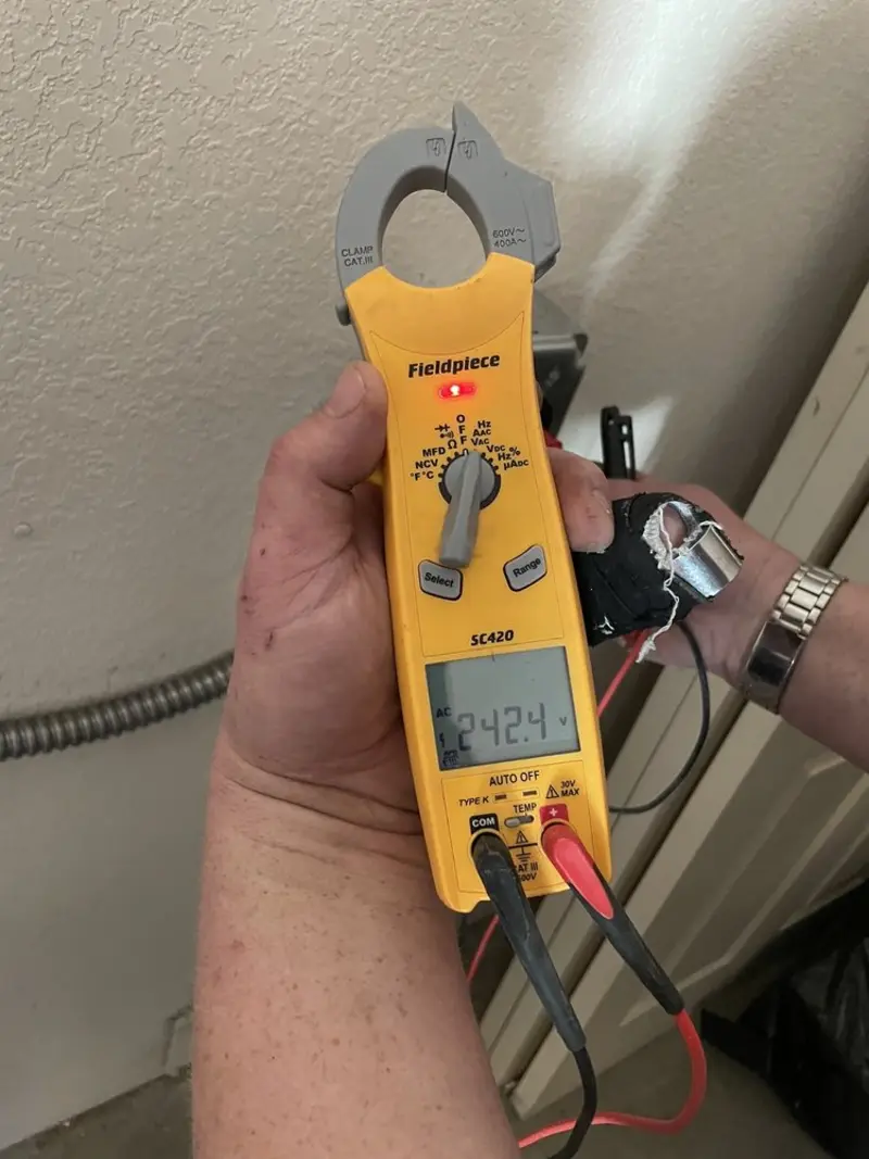 Voltage testing with clamp meter during Aluminum Wiring Replacement in North Bend
